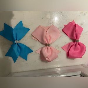PACK OF 3 ribboned bows with sequined middle. Barely worn blemishes pictured